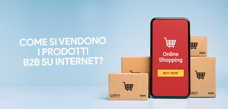 telefono mobile con all'interno la scritta shopping online posizionato vicino a alcuni pacchi per la spedizione di prodotti venduto da un portale b2b